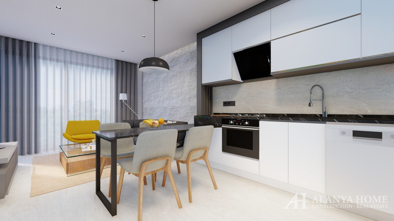 Фото купить продать недорогую двухкомнатную квартиру недвижимость 1+1 c просторной кухней Алания Хоу