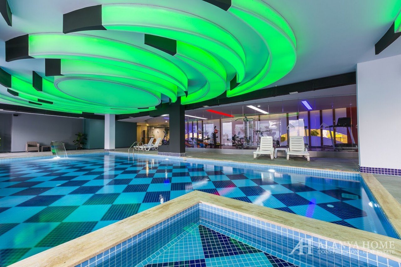 Фото купить продать недорогую квартиру недвижимость в доме жилом комплексе с крытым внутренним бассе