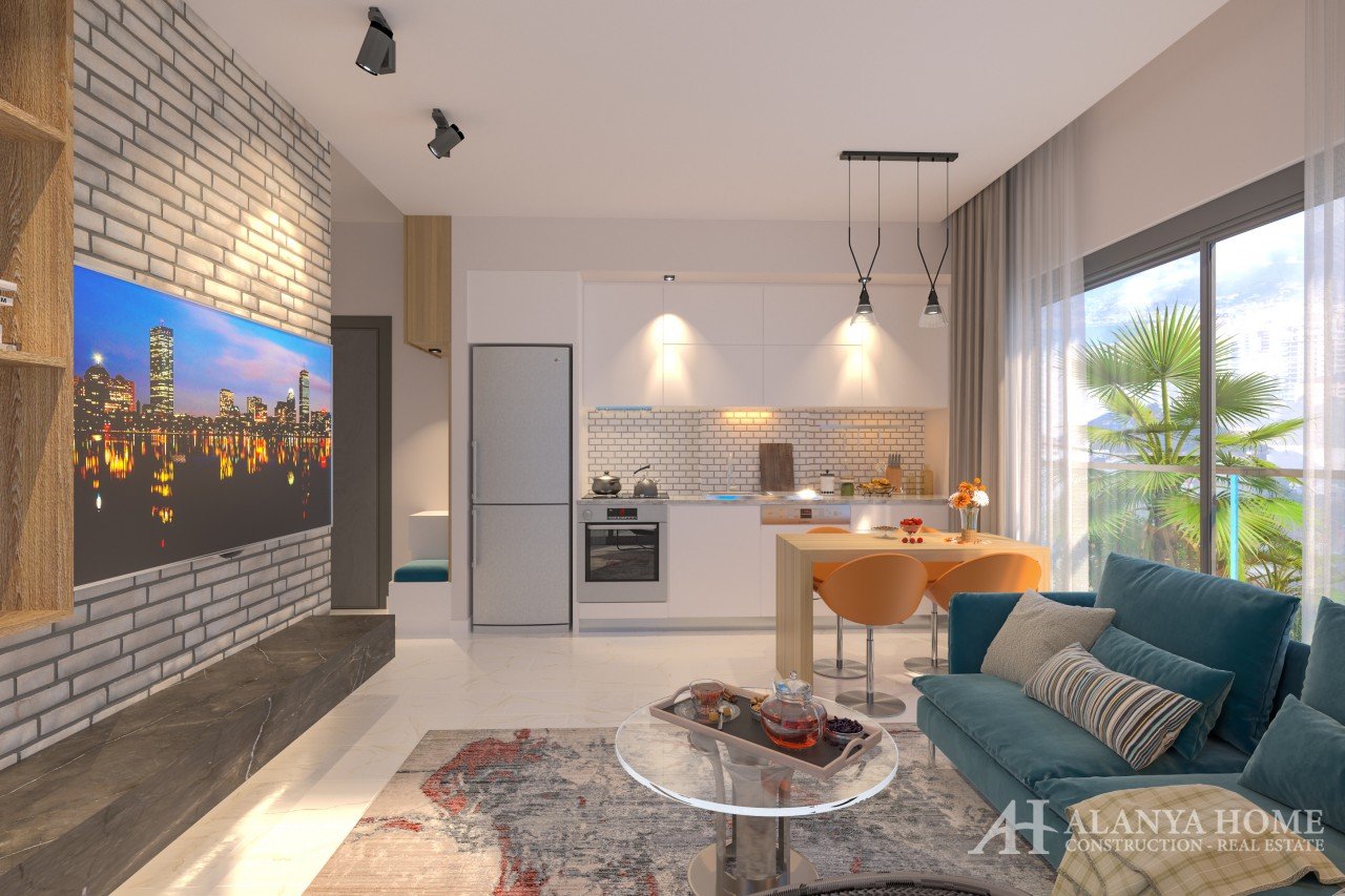 Фото покупка продажа недорогая двухкомнатная квартира 1+1 c просторной гостиной кухней студия Алания