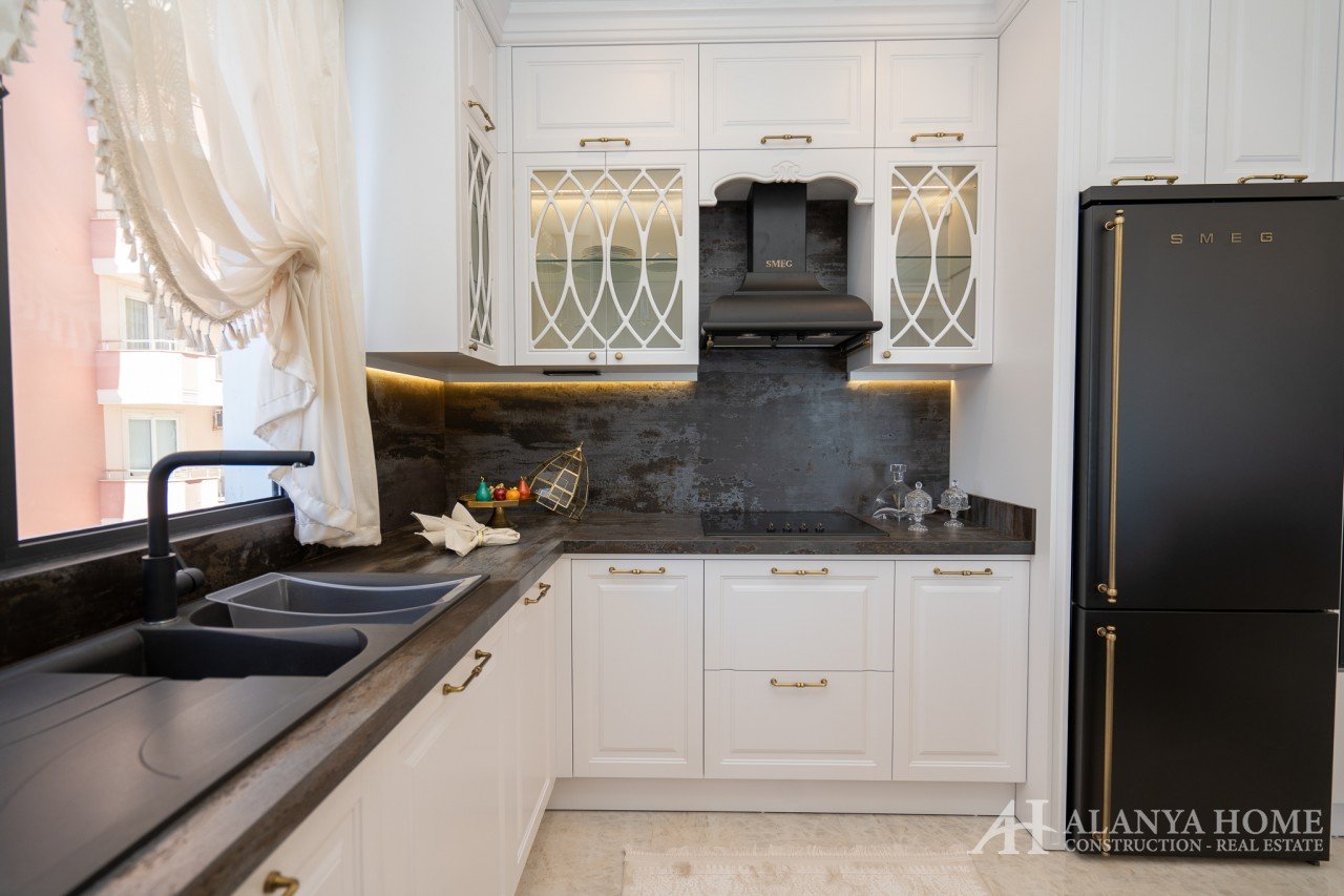 купить продать одна двух комнатную квартиру недвижимость кухня Алания Турция