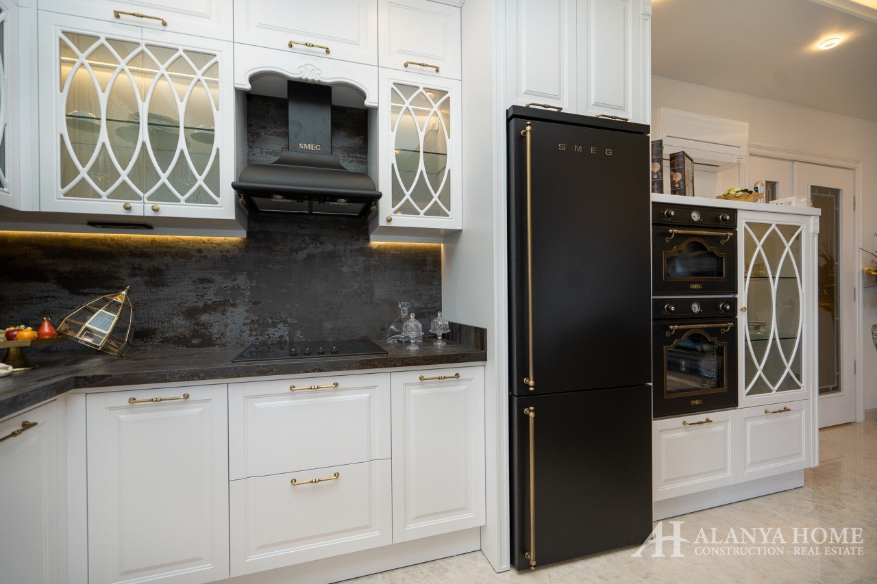 купить продать одна двух комнатную квартиру недвижимость кухня Алания Турция