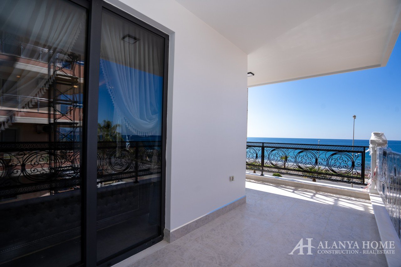 купить продать одна двух комнатную квартиру недвижимость большой террассой Алания Турция