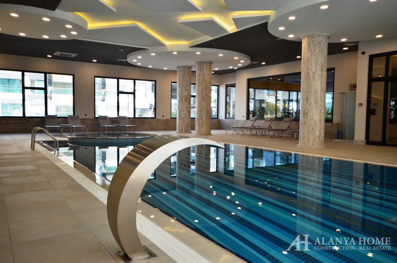 Фото покупка продажа недорогая квартира в доме жилом комплексе с крытым внутренним бассейном Алания 