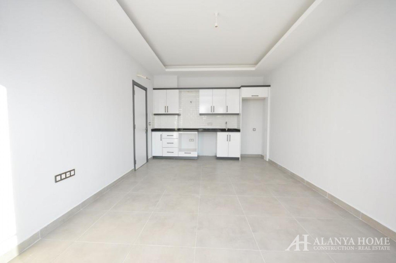 Фото покупка продажа недорогая мебелированная двухкомнатная квартира 1+1 Алания Хоум Анталия Турциия