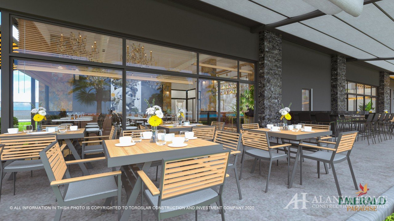 Фото купить продать недорогую квартиру недвижимость в доме жилом комплексе с кафе ресторанами Алания