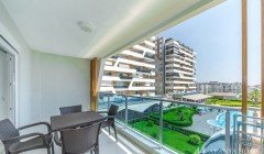 Фото купить продать недорогую двухкомнатную квартиру недвижимость 1+1 c большой террассой Алания Хоу